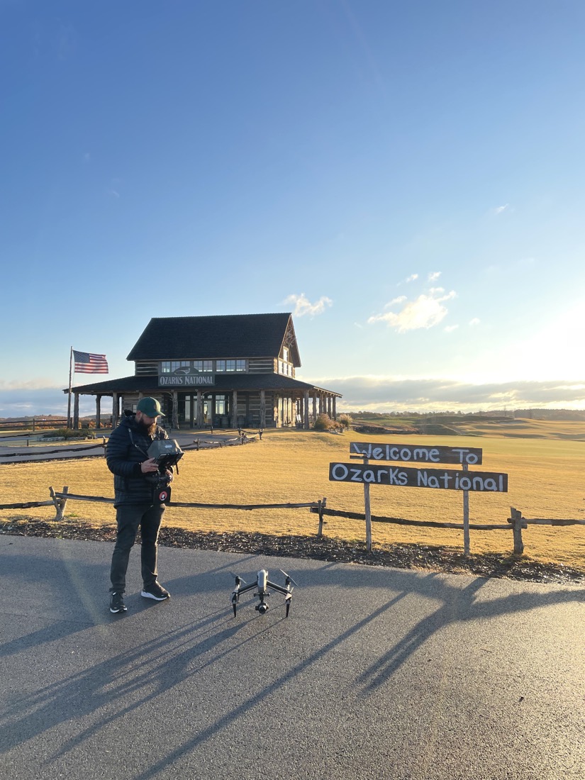 Drone operator setting up outside Ozarks National.