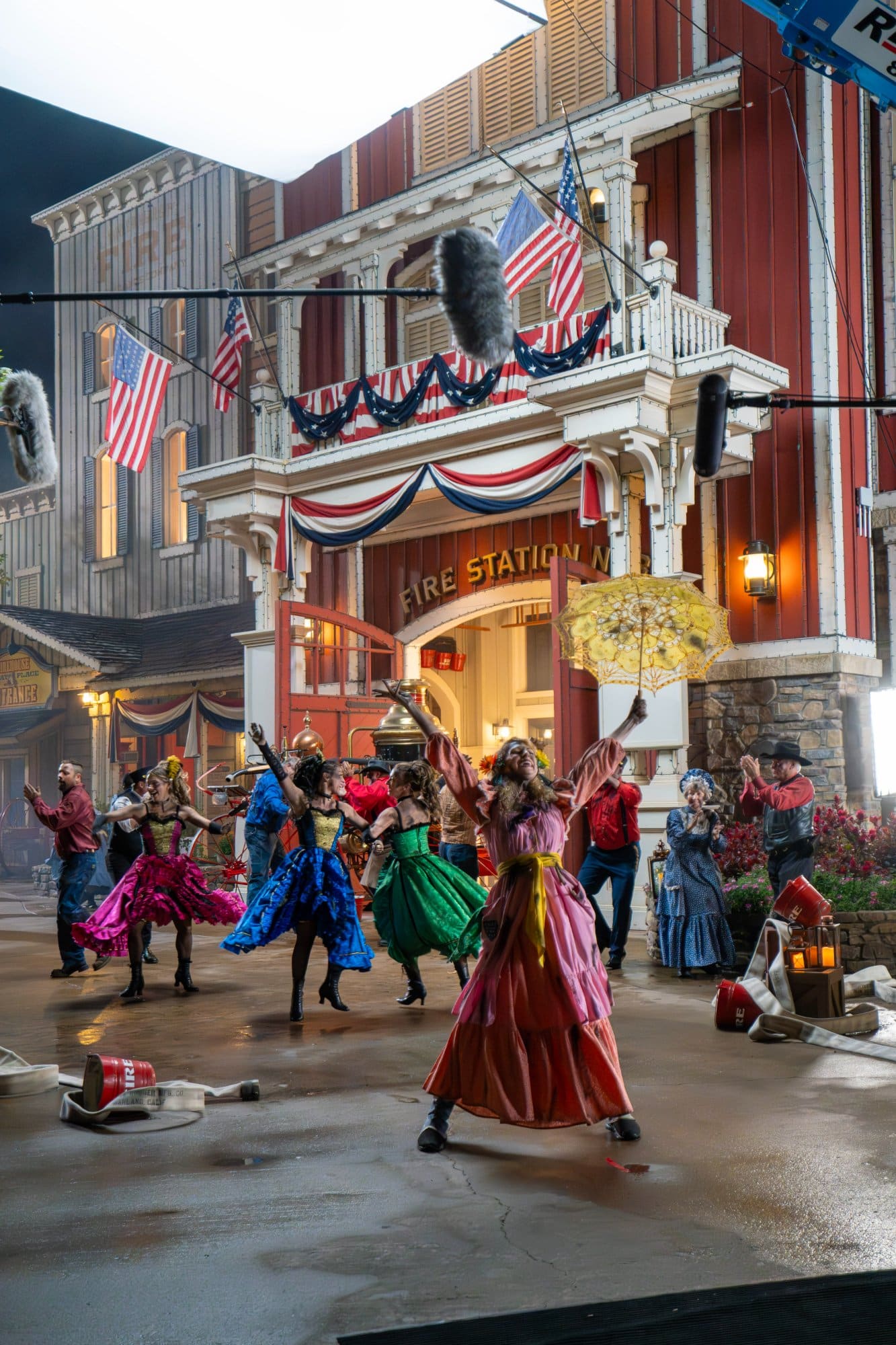 Dancers performing under stage lighting for the campaign spot