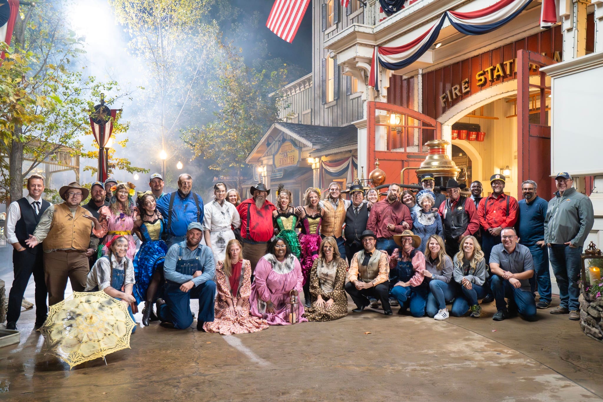 Cast and crew group photo outside the Fire In The Hole fire station at Silver Dollar City