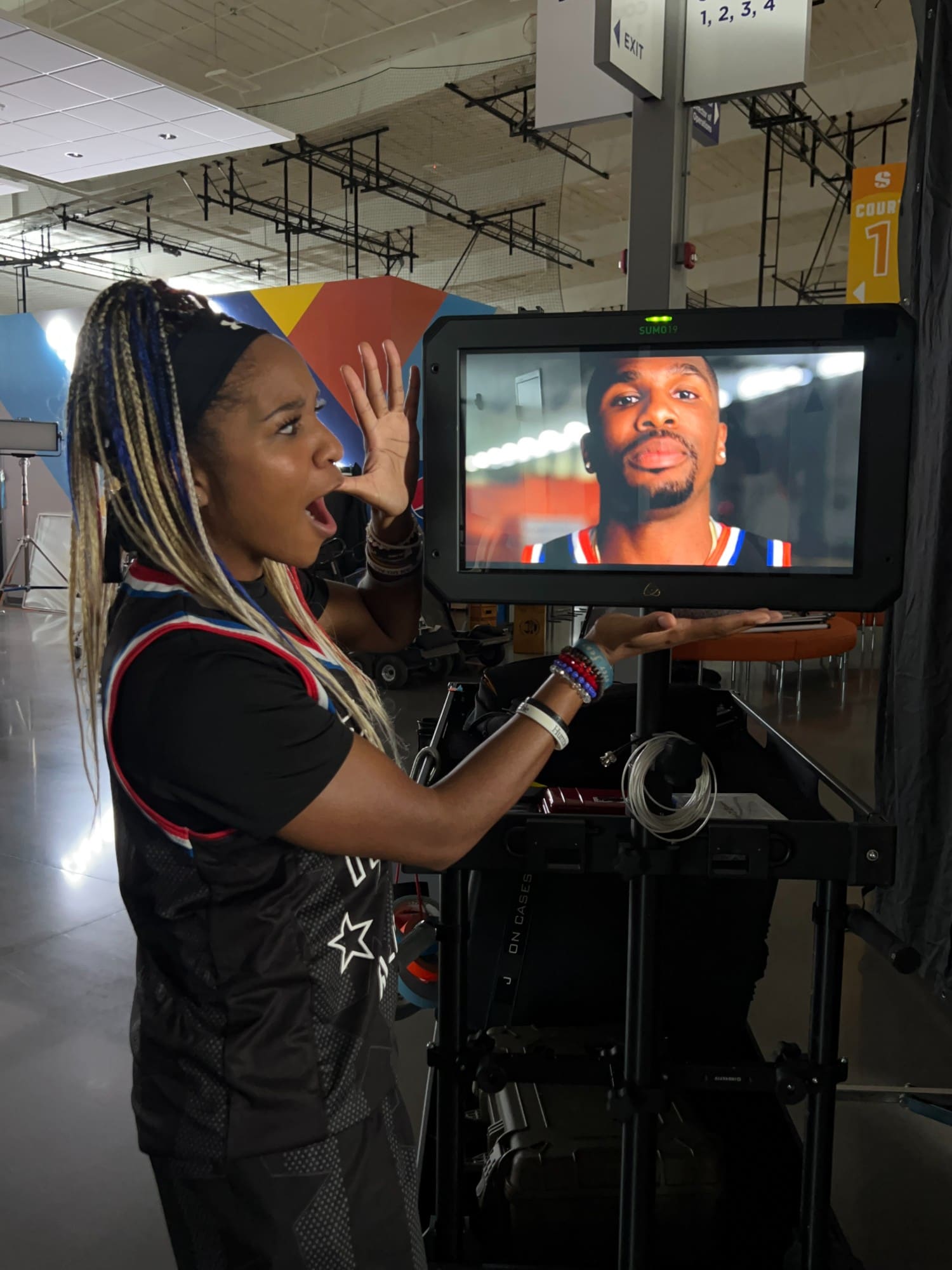 Globetrotters cast member reacting to a playback on the video village monitor