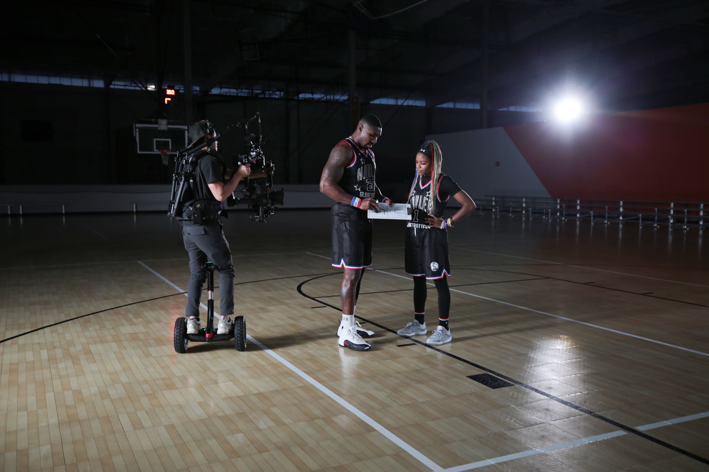 Globetrotters cast gathered for a slate before the next setup