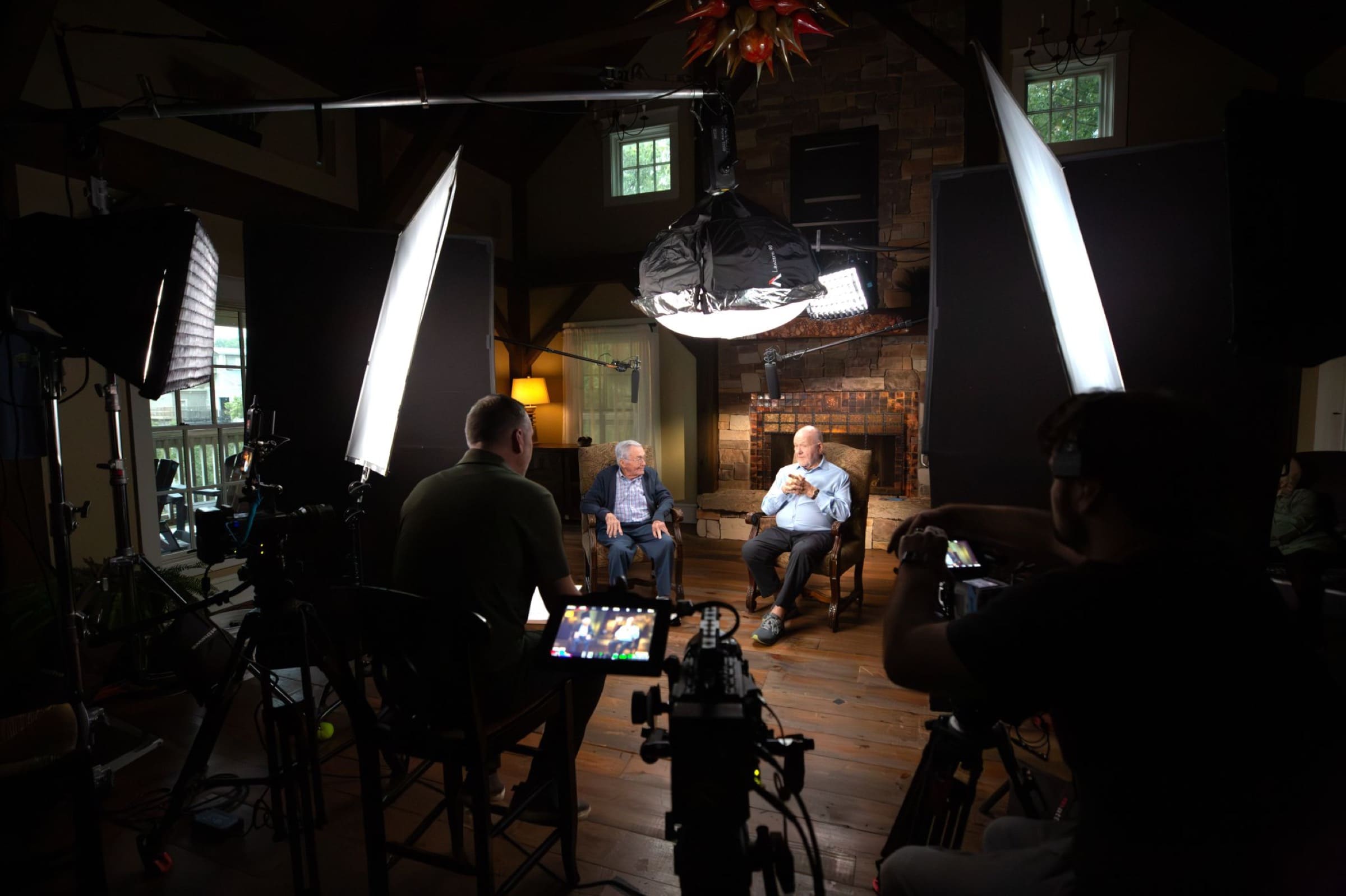 Herschend history interview production setup with lights and crew