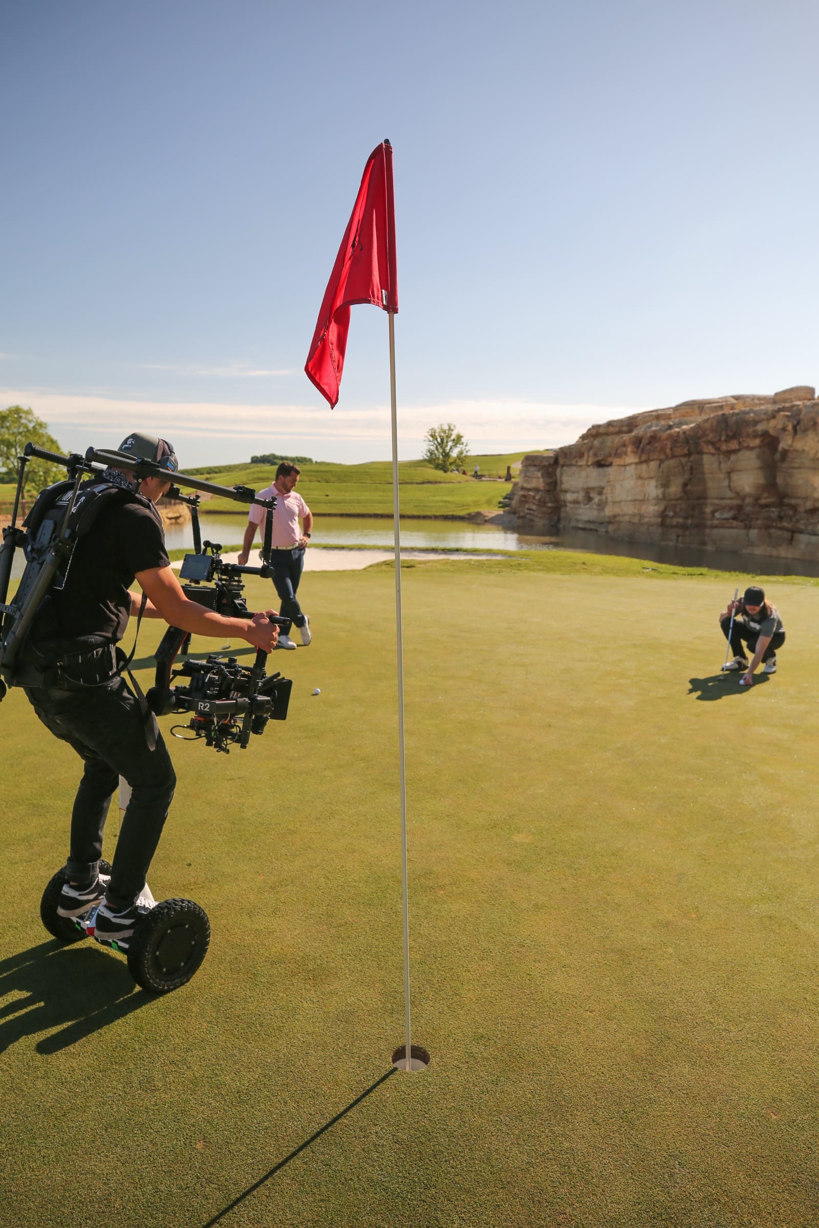 Camera crew filming on the green at Payne's Valley