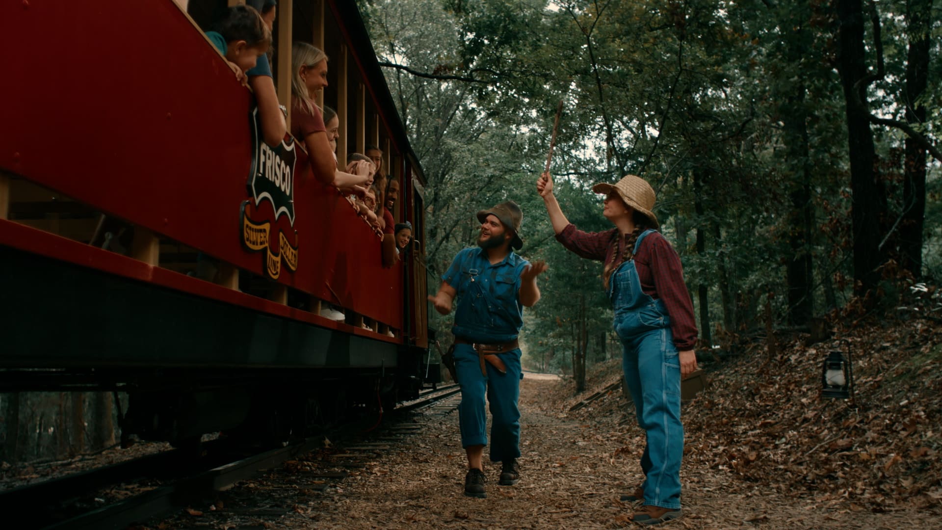 Silver Dollar City train conductors greeting guests during the Season Passport campaign