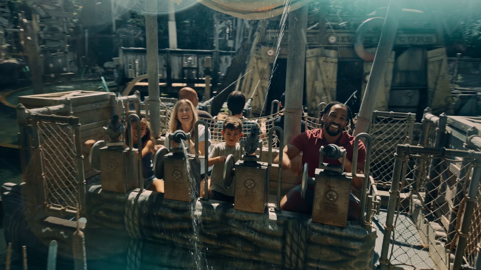 Family riding a Silver Dollar City water attraction during the Season Passport campaign