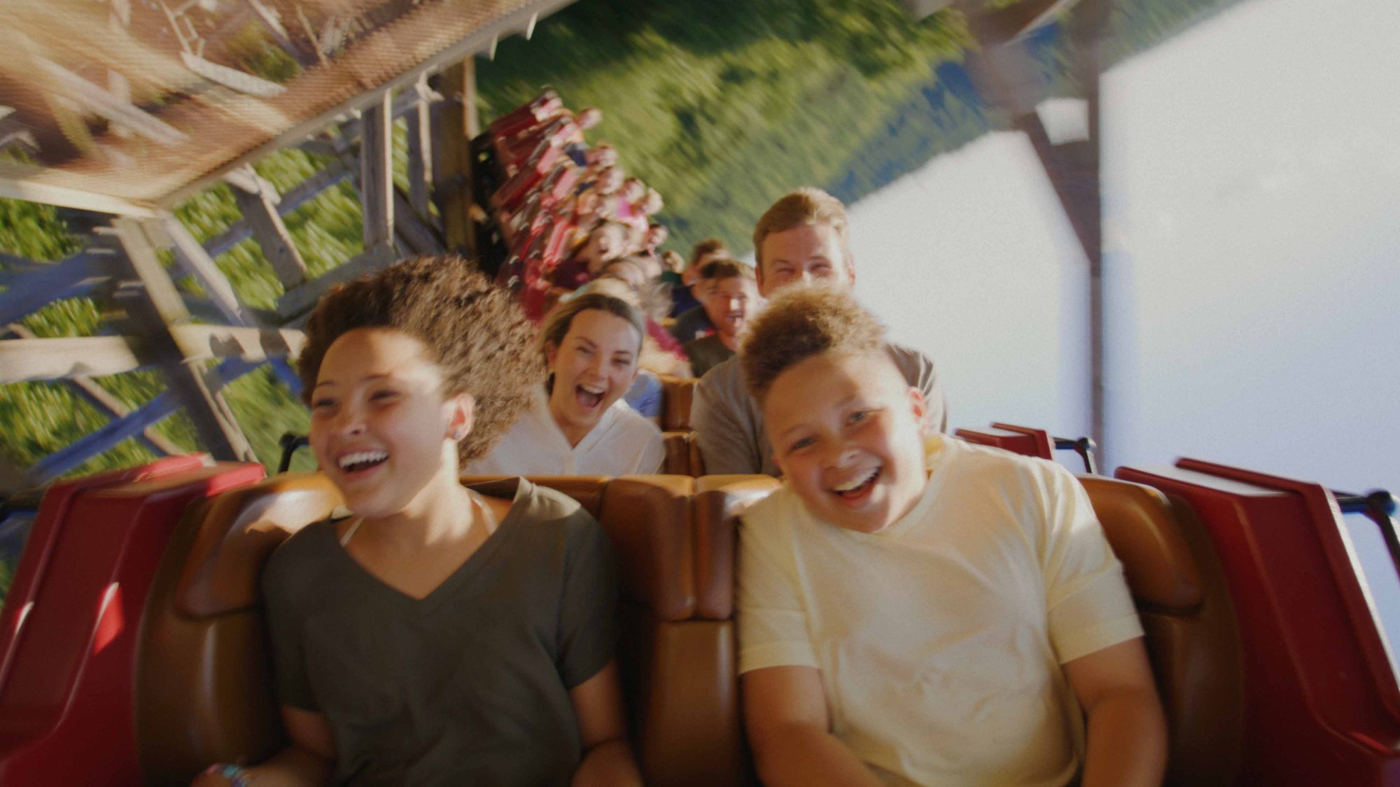 Guests riding a flagship coaster at Silver Dollar City