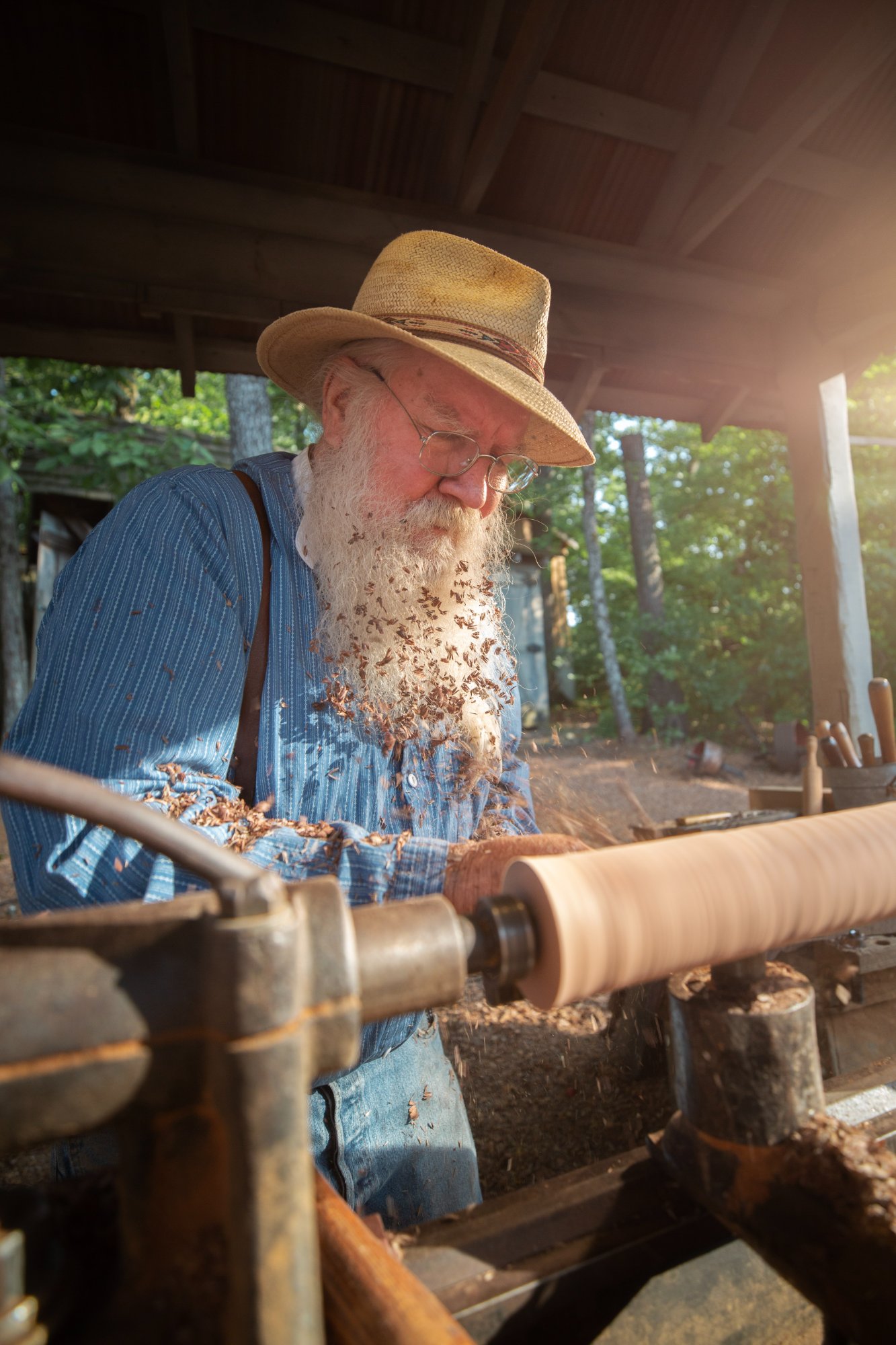 Woodturner at work inside the park craft spaces